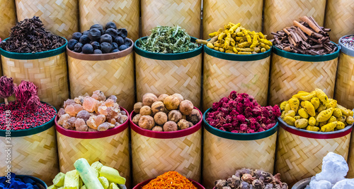 Fotografie, Obraz Spices and herbs on the arab street market stall