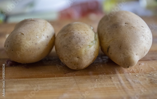 the fresh raw potatoes