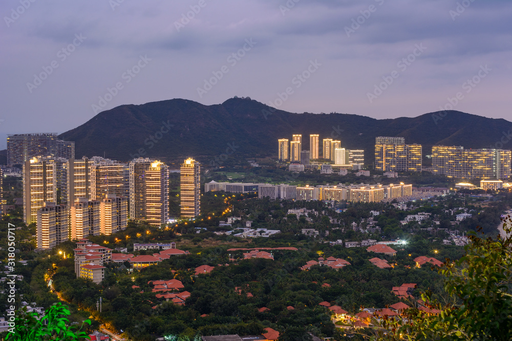 Obraz premium Evening view of Banshan Peninsula (Banshan Bandao), Xiao Donghai Beach from Luhuitou Mountain Park, Sanya, Hainan, China
