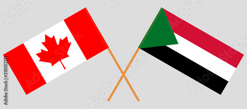 Crossed flags of Sudan and Canada