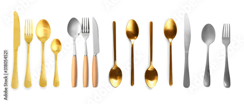 Set of different cutlery on white background