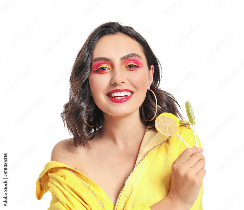 Beautiful young woman with lollipops on white background Beautiful young woman with lollipops on white background