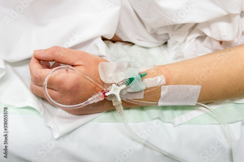 arm with infusion at operating room