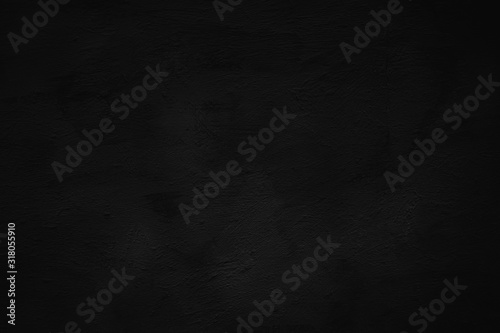 stucco wall surface in dark tonality. Background for design.