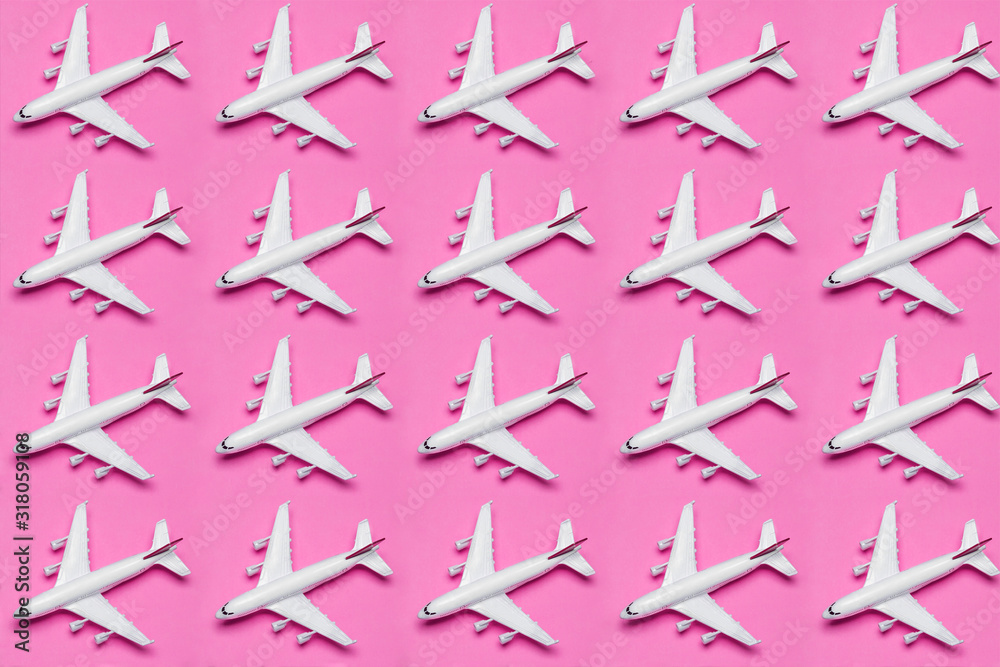 Travel minimal background. Model airplane in flight on an empty colored background. Copy space Travel minimal background. Model airplane in flight on an empty colored background. Copy space