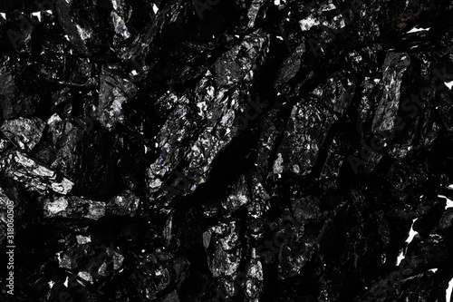 Black charcoal texture, natural mineral resource background photo
