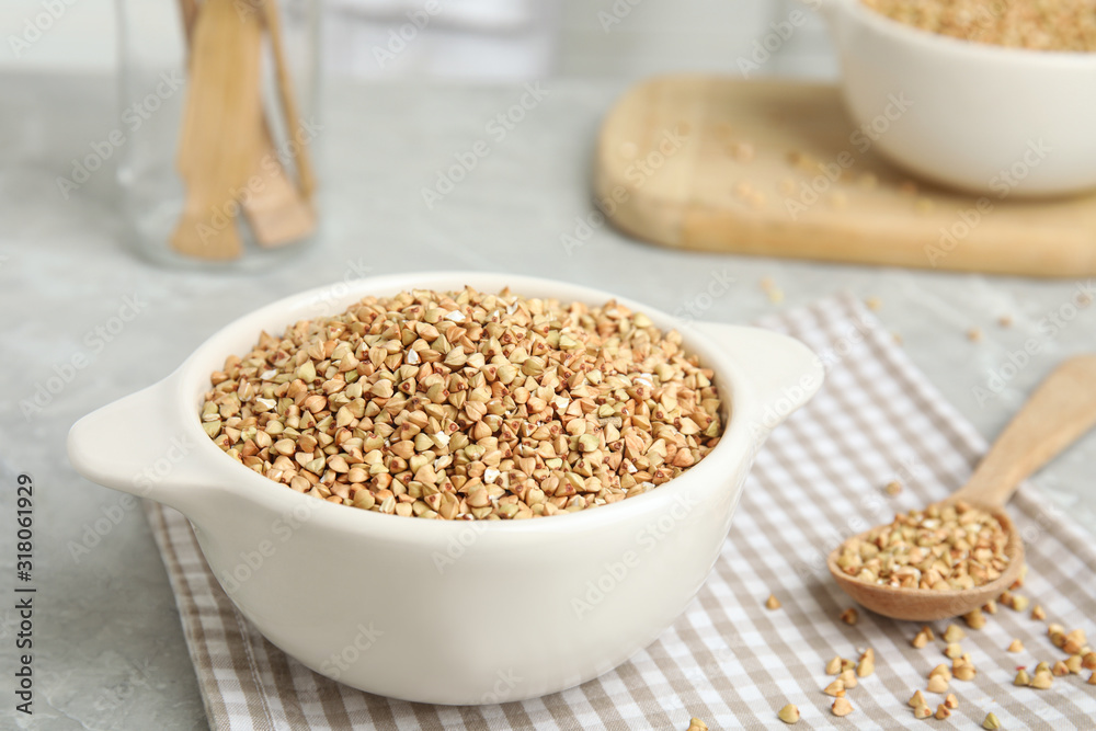 Organic green buckwheat on marble table. Healthy food Organic green buckwheat on marble table. Healthy food
