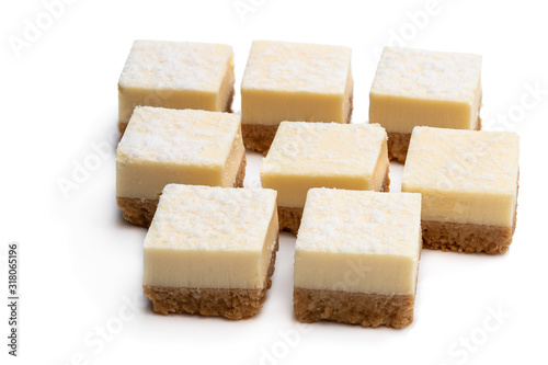 Set of mini vanilla cheesecake bites isolated on white