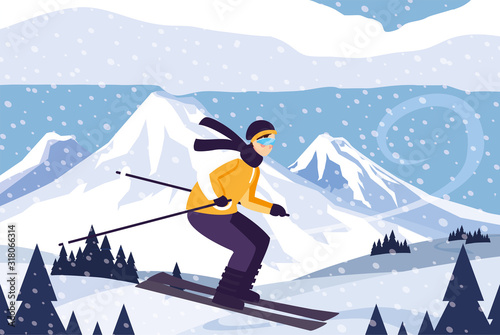 man with mountain ski in landscape with snowfall