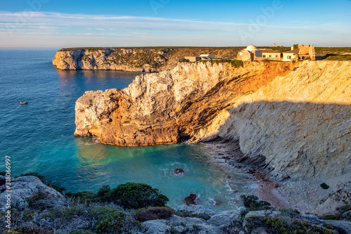 Sagres, Portugal - beautiful sunrise colors over lighthouse on Atlantic coast 