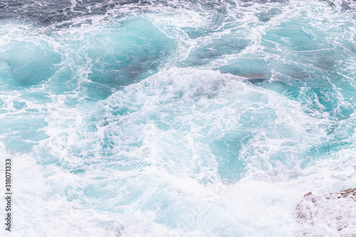 Ocean coast, moviment waves with foam. © sytnik