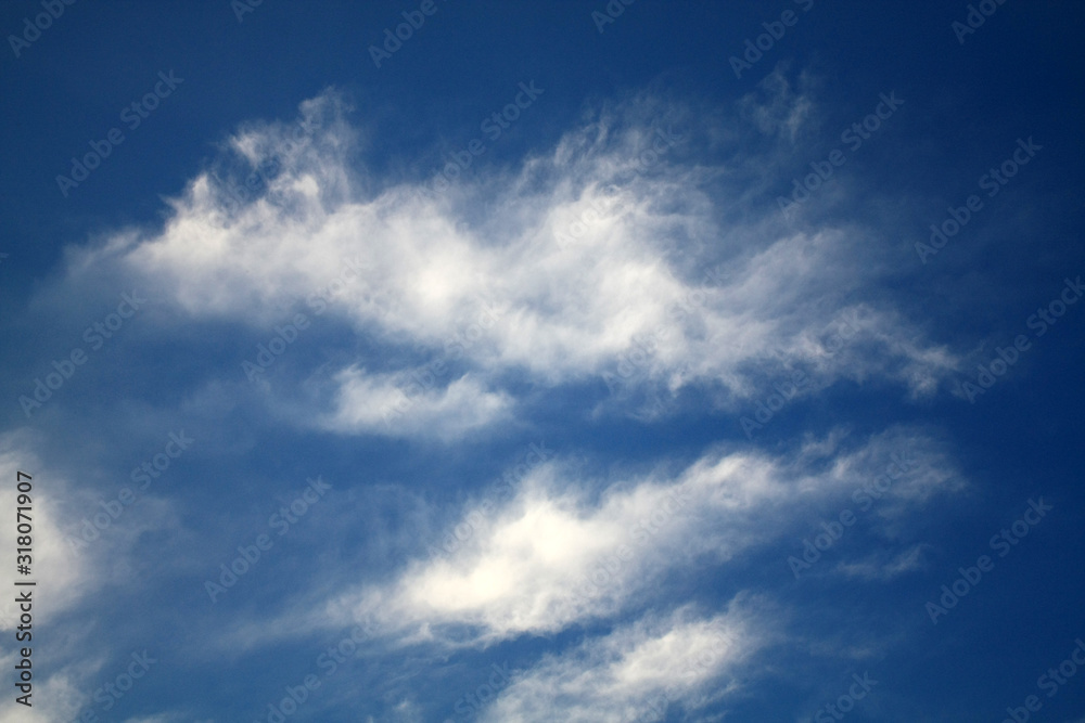 storm clouds on deep blue sky