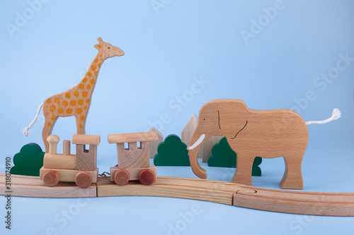Wooden toys for children on blue background. Eco Toys Background