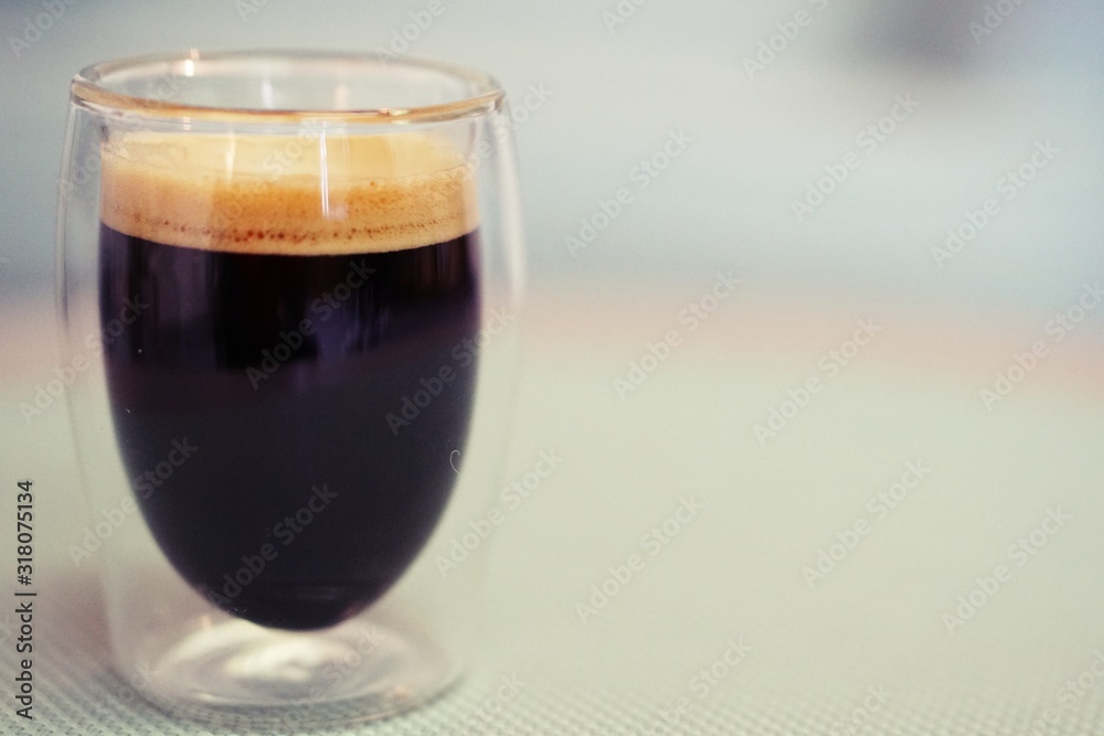 Coffee time in office. Capsule espresso in double glass cup - 100% arabica Coffee time in office. Capsule espresso in double glass cup - 100% arabica