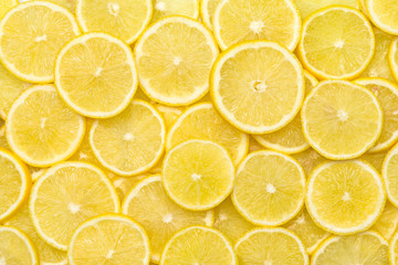 Fresh lemon slices pattern backgrond, close up
