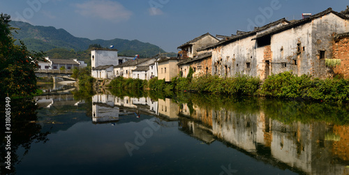 Panorama of Hui style houses on the Longxi river in Chengkan village China photo