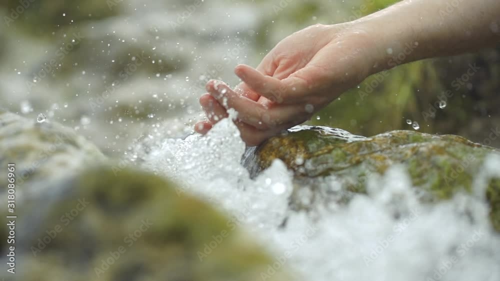 Man drink fresh water from spring Slow Motion shot
