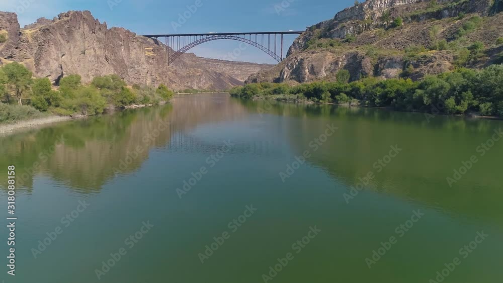 Low over the Snake River with paddle boarders and the Perrine Bridge Low over the Snake River with paddle boarders and the Perrine Bridge