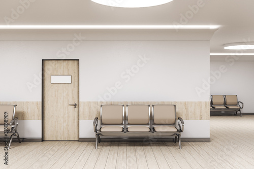 Waiting room in medical office interior with chairs