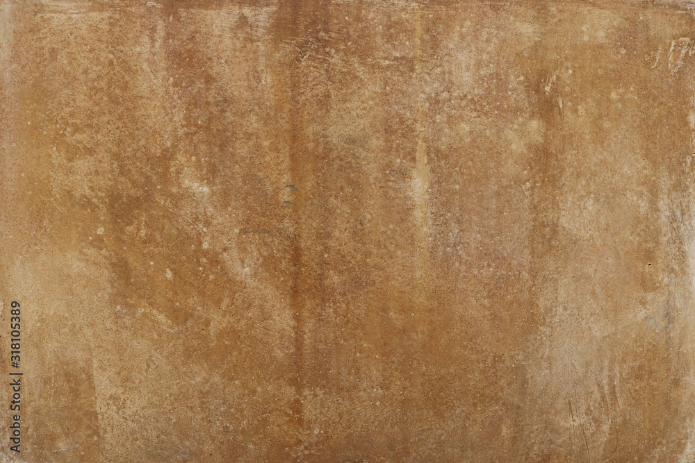 Naklejka premium epic blank stone surface wall or ancient dirty paper texture background in brown and golden color with moisture lines and marks