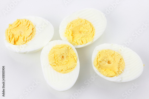 sliced boiled eggs isolated on white background