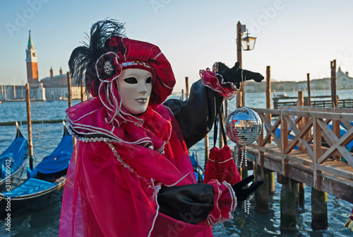 Italy, Venice colorful carnival masks. © claudiozacc