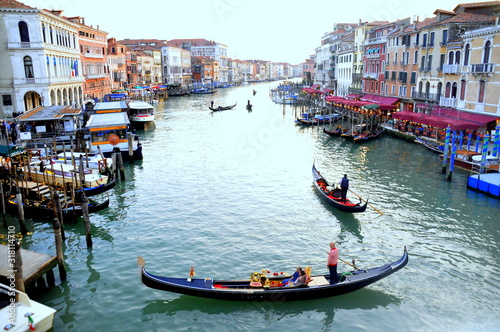 The view of boats and building by Rialto Bridge in Venice, Italy © K.A