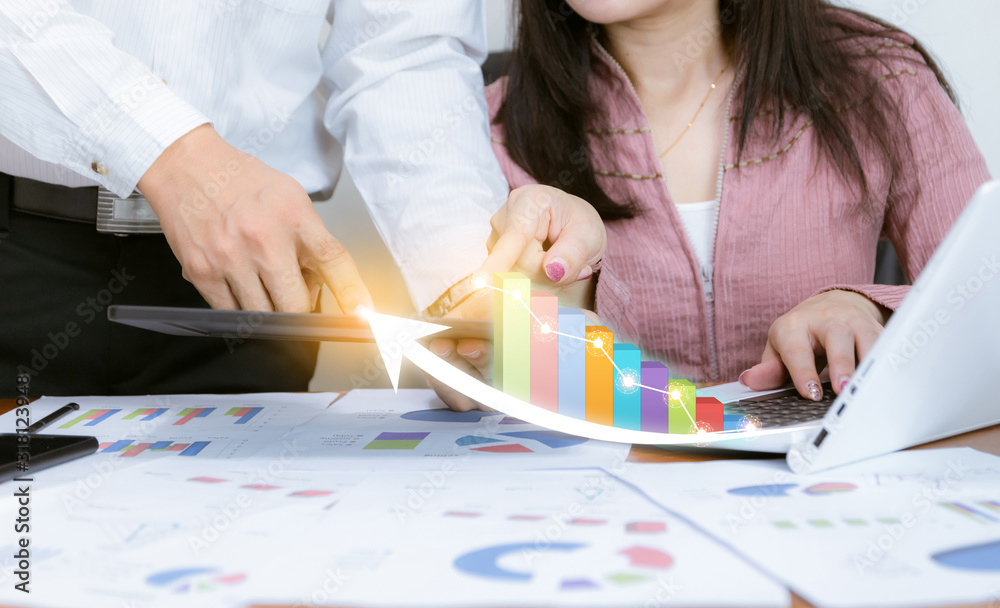 Business analyze graphs with the technology development pointing graph corporate to success and growing plan concept Business analyze graphs with the technology development pointing graph corporate to success and growing plan concept