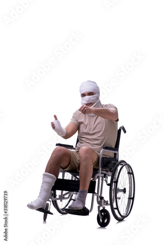 Injured man in wheel-chair isolated on white