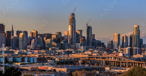 San Francisco city skyline panorama after sunset with city lights, the Bay Bridge and highway leading into the city © SvetlanaSF