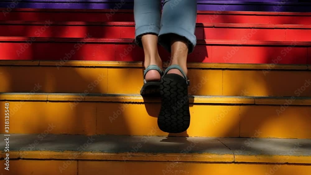 Walking up at colorful rainbow stairs famous in Istanbul, Turkey