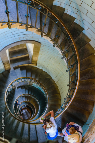 Beautiful spiral staircase to the top of Eckmuhl lighthouse  on the Penmarsh Peninsula.  Brittany. France