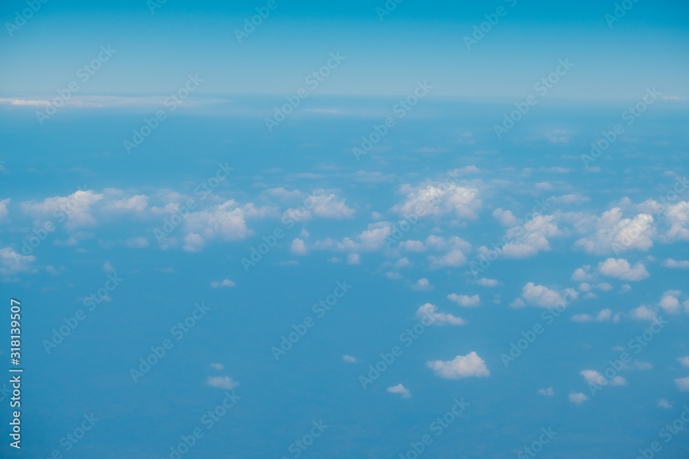 Fototapeta premium Nature background of blue sky with fluffy cloud above view