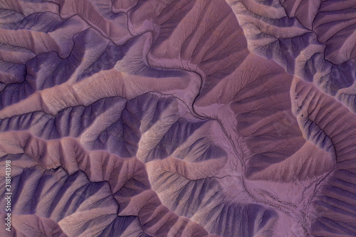 aerial view of colorful desert abstract organic texture badlands photo