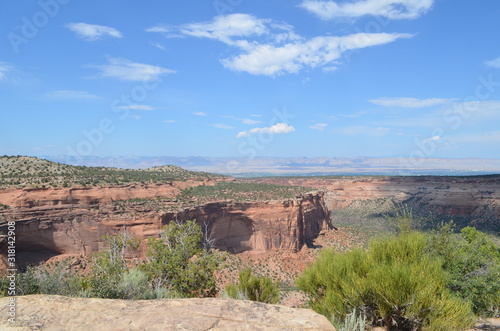 Early Summer in Colorado: Monument Canyon with Grand Valley and the Book Cliffs in the Distance As Seen From the Coke Ovens Overlook Along Rim Rock Drive in Colorado National Monument