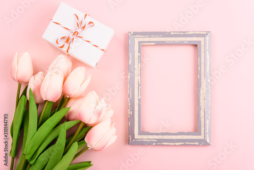 Happy Women's Day, Mother's Day concept. top view flat lay photo frame and Tulip flower © sorapop