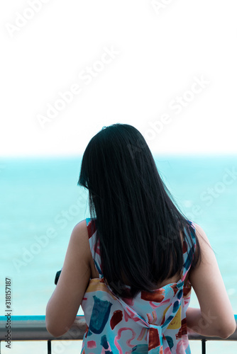 Woman relax at sea viewpoint in concept travel