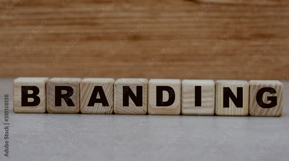 concept word branding on cubes on a wooden background concept word branding on cubes on a wooden background