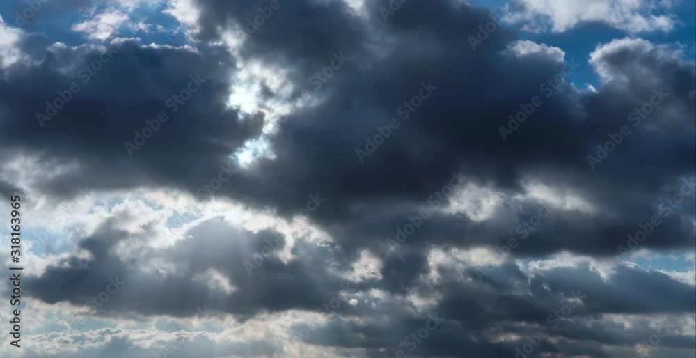 Beautiful big and fluffy clouds motion time lapse, at sunny day in blue sky. Beautiful big and fluffy clouds motion time lapse, at sunny day in blue sky.