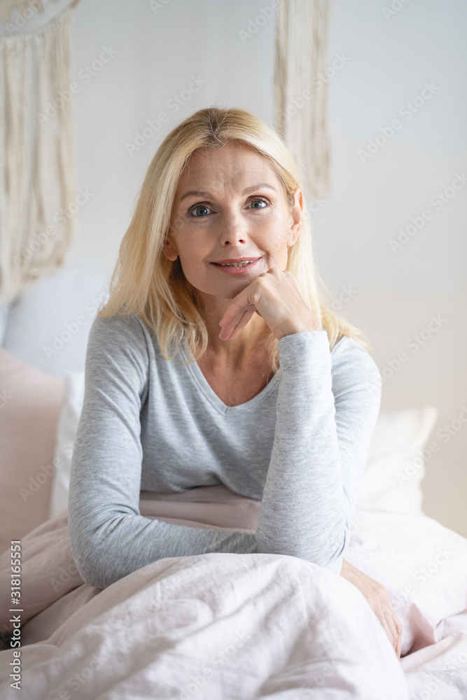 Calm glance of relaxed mature woman stock photo Calm glance of relaxed mature woman stock photo