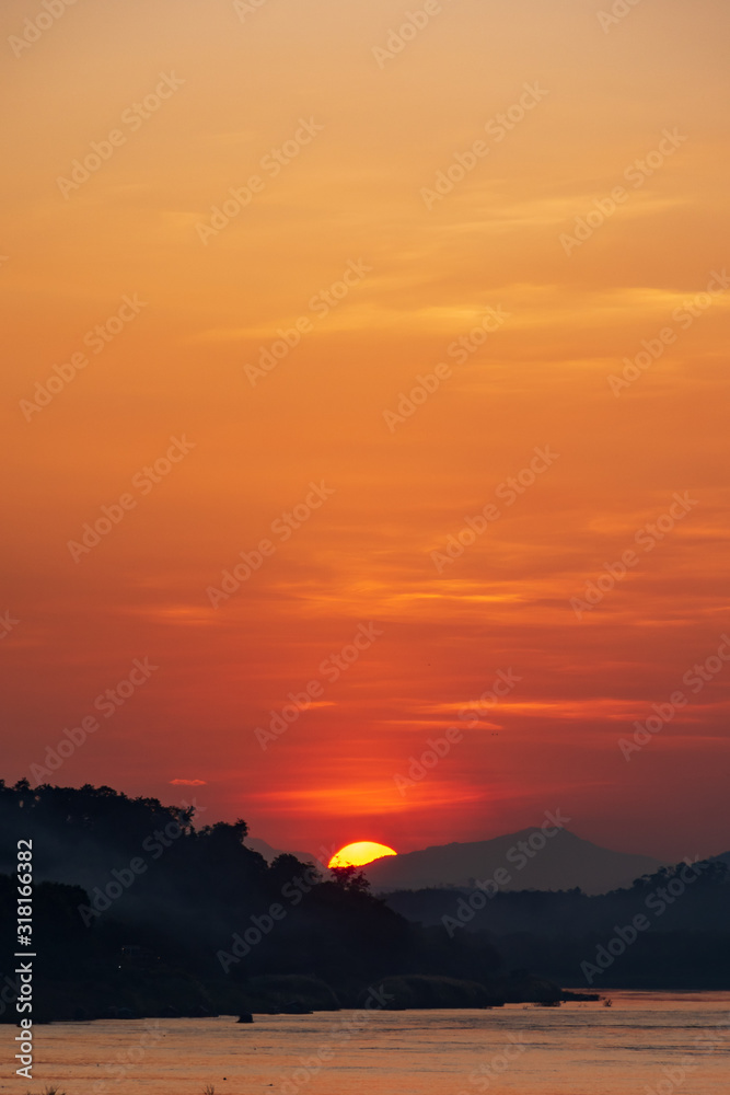 Scenic View Of Landscape Against Sky During Sunset