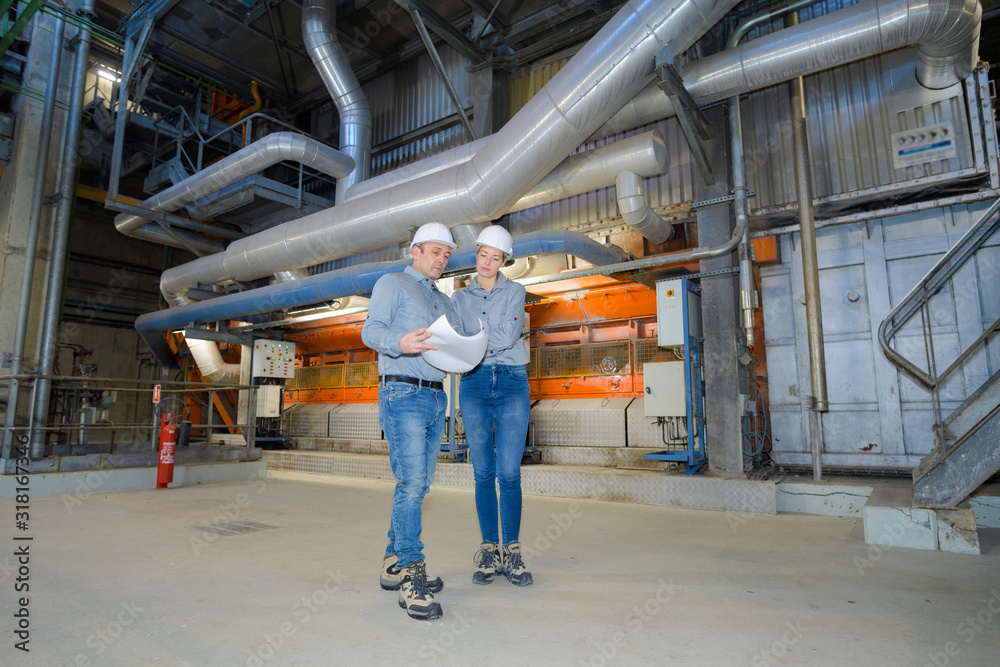 Obraz premium workers inside an industrial plant