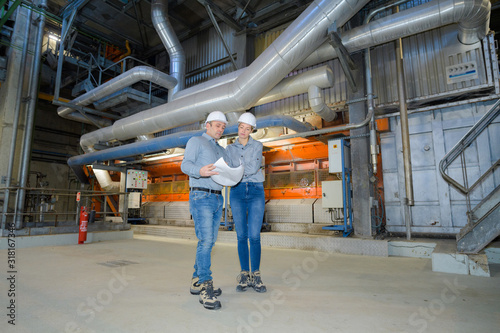 workers inside an industrial plant