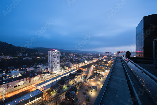 cityscape at night time from loerrach in southern germany. photo