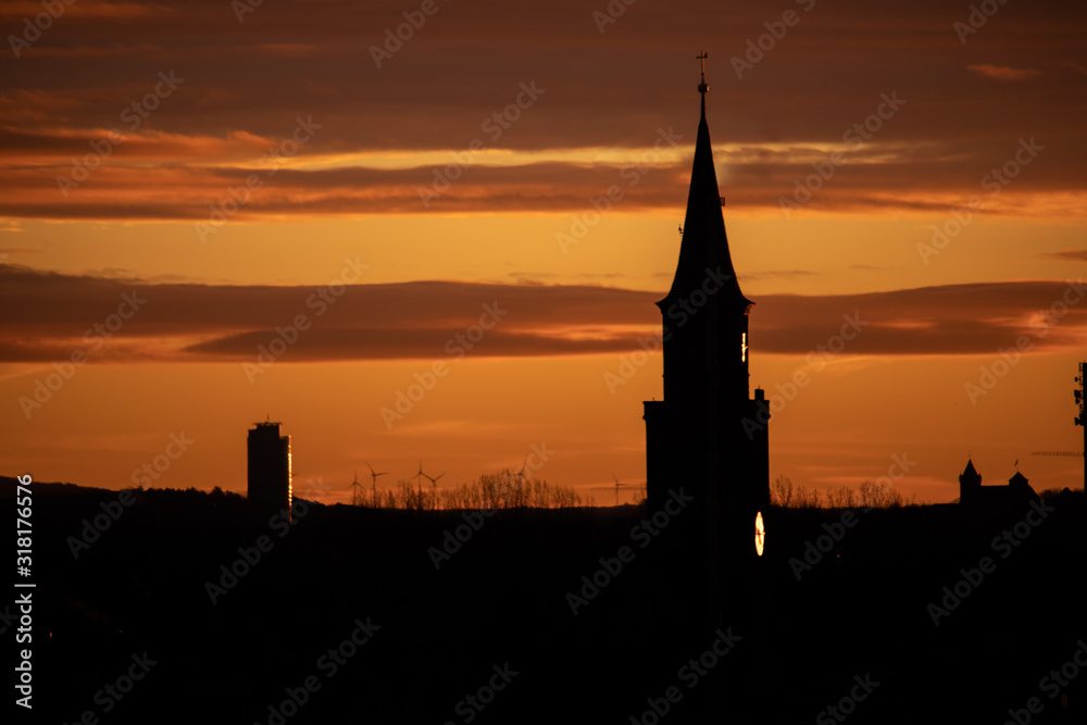 Silhouette of church at sunrise, Fuerth, Germany