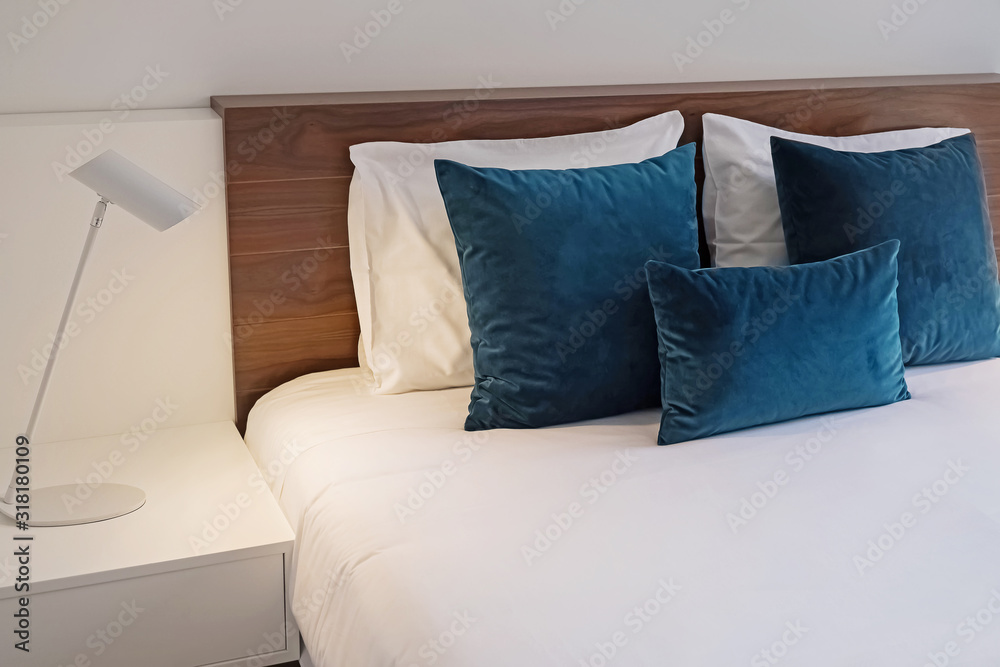 Minimalist clean and modern bedroom with white walls Minimalist clean and modern bedroom with white walls