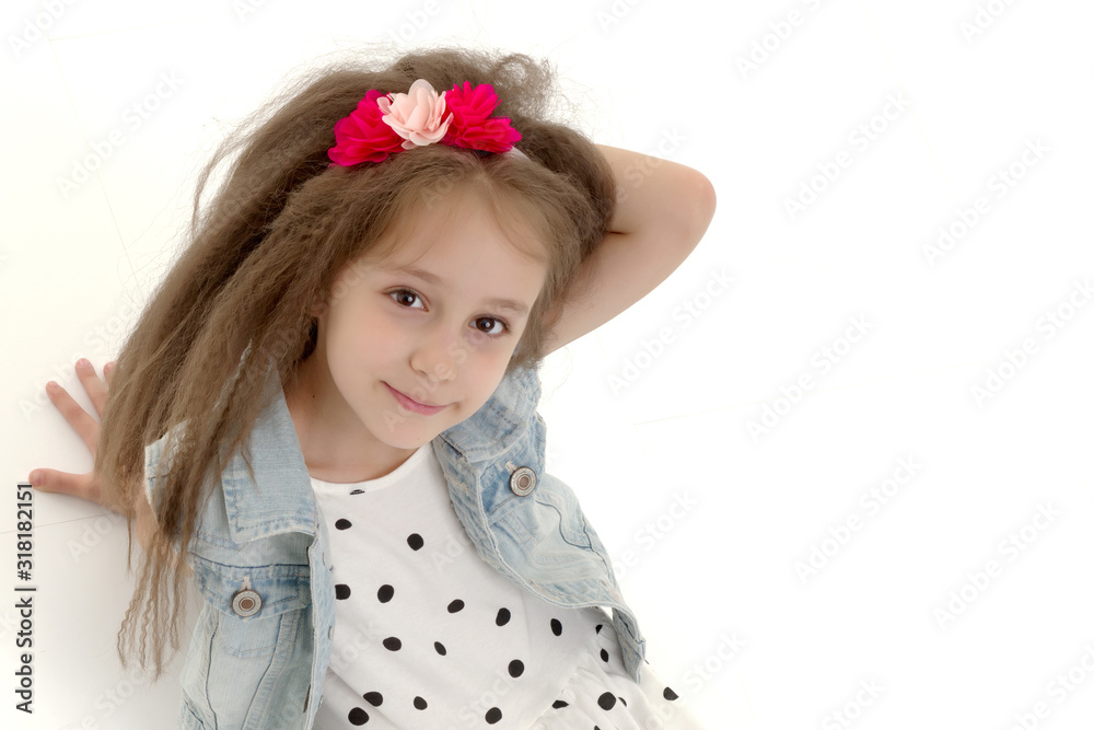 Little girl lies on the floor
