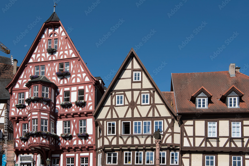 Miltenberg, Germany - July 24, 2019; City view with half timbered houses on a blue sky in the city of Miltenberg a touristic town on the romantic road in Bavaria