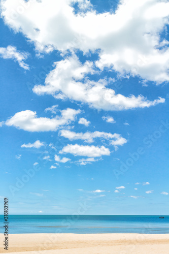 Blue sky with whit cloud, sea and beach background with copy space © catinsyrup
