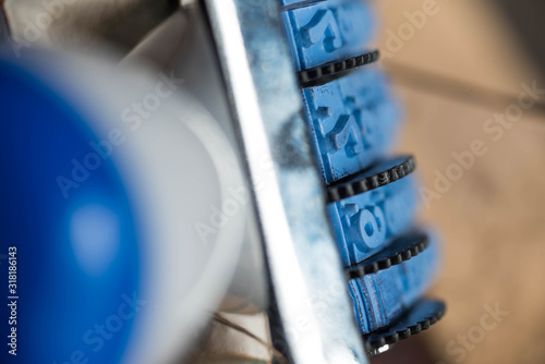 A blue rubber date stamp. Close up macro shot. 